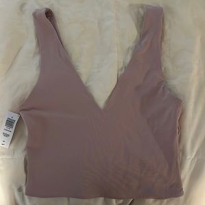 Mauve v-neck babaton tank from artizia! Never worn, brand new with tags